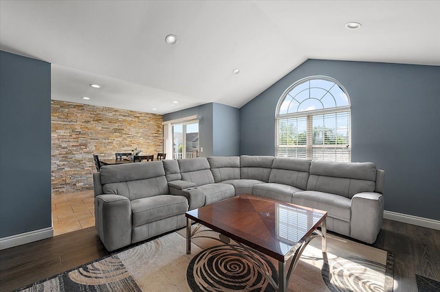 living room featuring wood finished floors, vaulted ceiling, recessed lighting, and baseboards