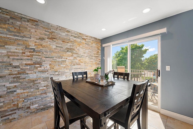 dining area featuring recessed lighting, light tile patterned flooring, and baseboards
