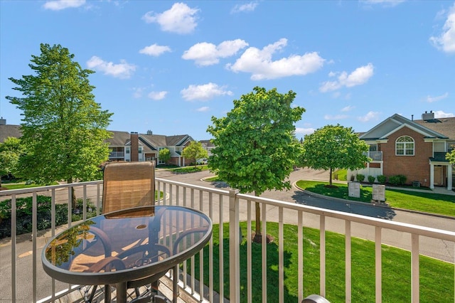 balcony featuring a residential view