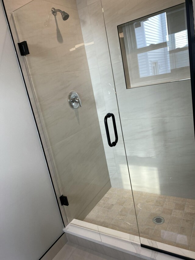 full bathroom with a stall shower