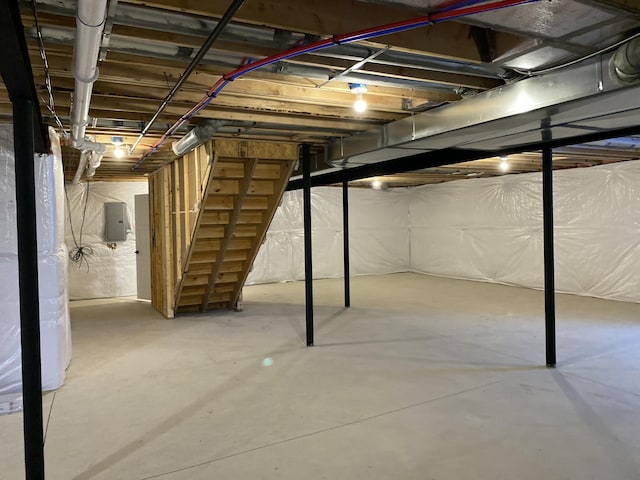 unfinished basement with electric panel