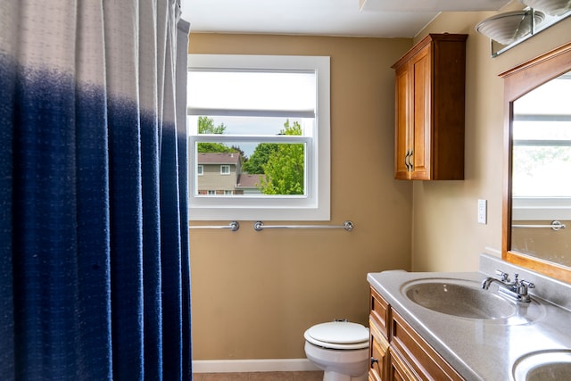 42438 Somerset Ct, Canton, MI 48187 - full bathroom with toilet, double vanity, and tile patterned flooring