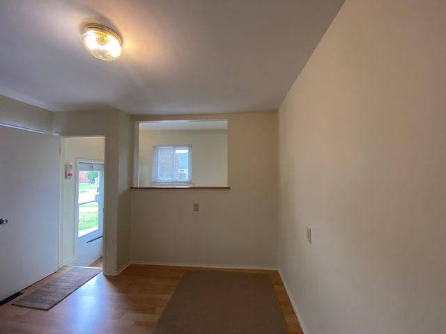 657 Highland Ave, Lincoln Park, MI 48146 - spare room featuring wood finished floors and baseboards