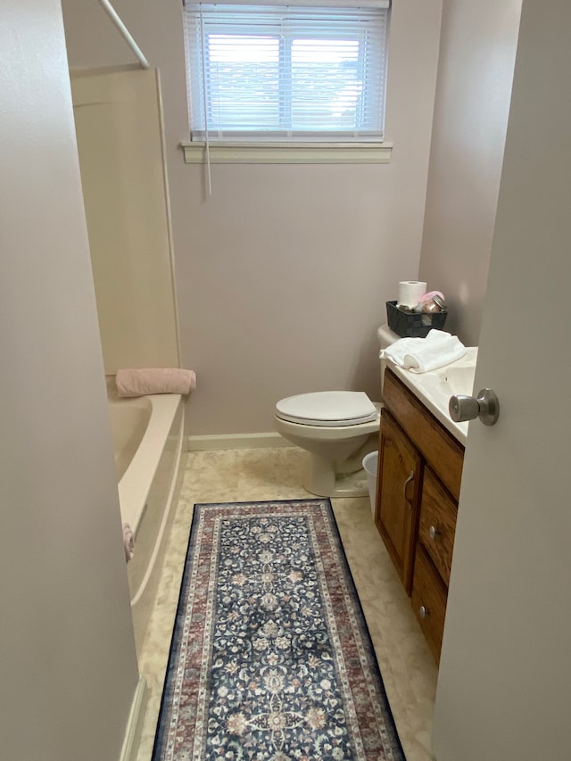 657 Highland Ave, Lincoln Park, MI 48146 - bathroom featuring vanity, toilet, baseboards, and washtub / shower combination