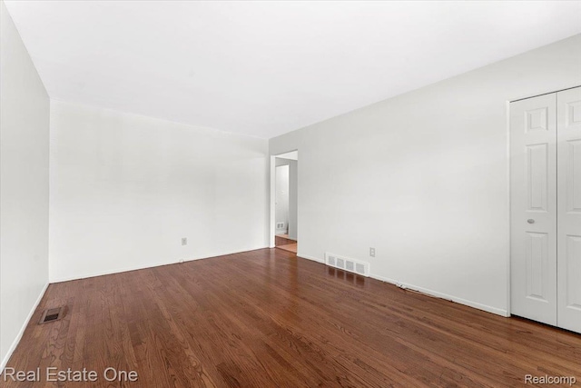 657 Highland Ave, Lincoln Park, MI 48146 - unfurnished room featuring wood finished floors
