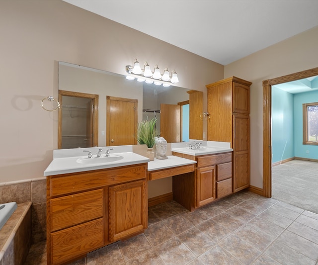 full bath featuring vanity and baseboards