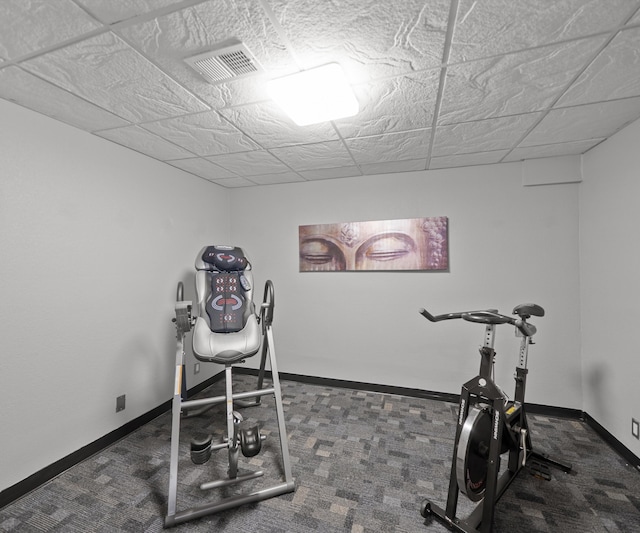 workout area with carpet floors and baseboards