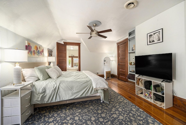 210 E St, Three Rivers, MI 49093 - bedroom with wood finished floors, lofted ceiling, a ceiling fan, and baseboards