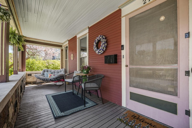 210 E St, Three Rivers, MI 49093 - deck with a porch and an outdoor hangout area