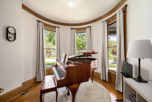 210 E St, Three Rivers, MI 49093 - sitting room with crown molding, light wood-style flooring, and baseboards