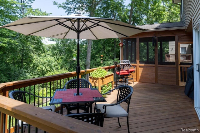3163 W Ridge Ct, Commerce Twp, MI 48390 - wooden terrace featuring outdoor dining space and a sunroom