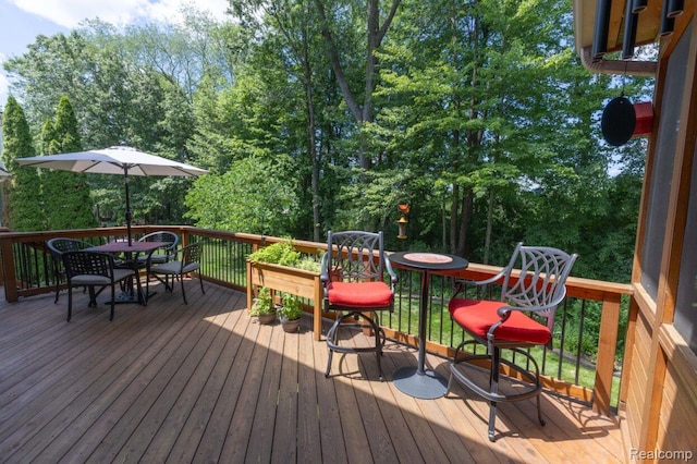 3163 W Ridge Ct, Commerce Twp, MI 48390 - wooden terrace featuring outdoor dining space