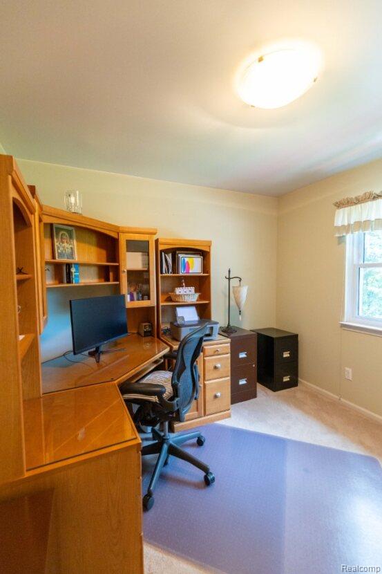 3163 W Ridge Ct, Commerce Twp, MI 48390 - home office featuring light carpet
