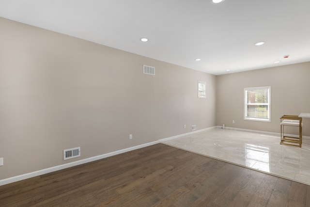 570 King St, Detroit, MI 48202 - unfurnished room featuring wood finished floors, recessed lighting, and baseboards