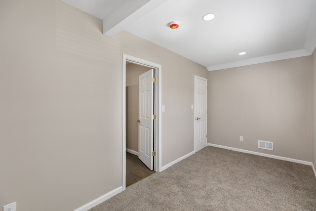 570 King St, Detroit, MI 48202 - unfurnished bedroom featuring carpet flooring, beamed ceiling, baseboards, and recessed lighting