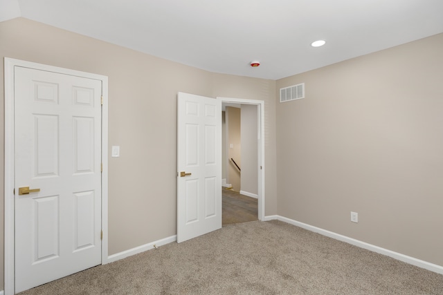 570 King St, Detroit, MI 48202 - unfurnished bedroom featuring carpet, baseboards, and recessed lighting