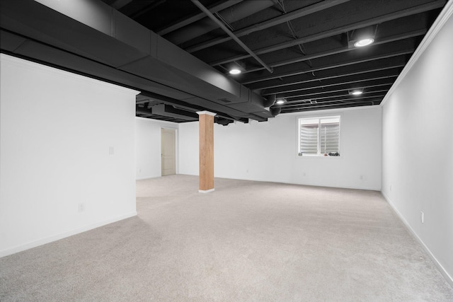 below grade area featuring carpet flooring
