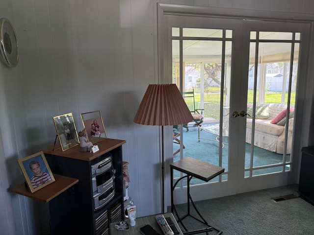 27 Turrill Ave, Lapeer, MI 48446 - doorway to outside featuring carpet flooring and french doors