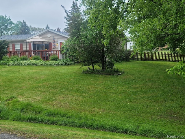 3092 Durant Hts, Grand Blanc, MI 48507 - view of yard featuring a deck