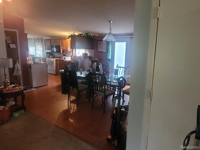 3092 Durant Hts, Grand Blanc, MI 48507 - dining space with healthy amount of natural light and light wood-style flooring