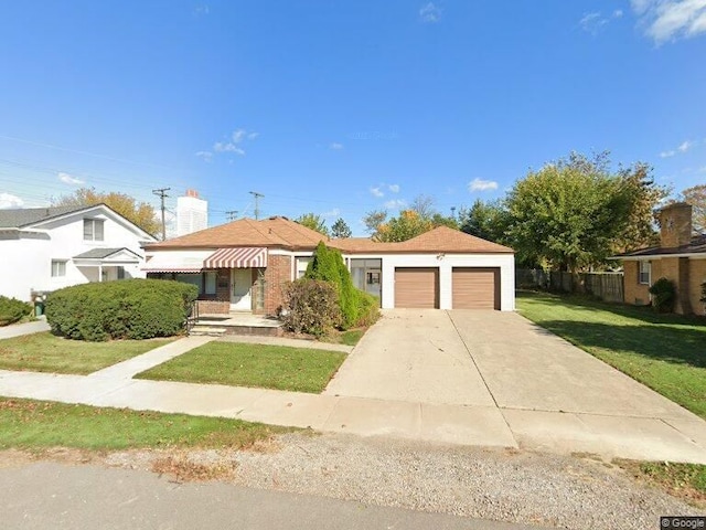 3850 Demean St, Melvindale, MI 48122 - view of front of home with an attached garage and driveway