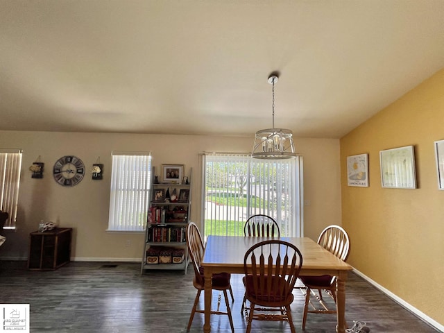 9304 Orchard Ct, Davison, MI 48423 - dining room featuring dark wood-type flooring, baseboards, and a chandelier