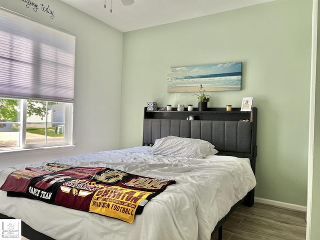 9304 Orchard Ct, Davison, MI 48423 - bedroom with wood finished floors and baseboards