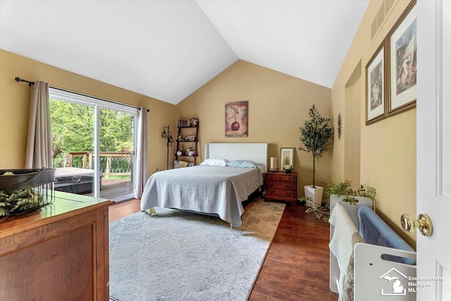 25345 Hunter Ln, Flat Rock, MI 48134 - bedroom with access to exterior, vaulted ceiling, and dark wood-type flooring