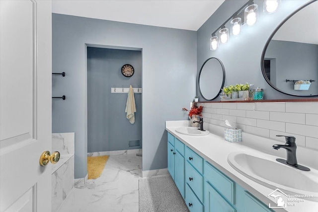 25345 Hunter Ln, Flat Rock, MI 48134 - full bath featuring marble finish flooring, double vanity, and baseboards