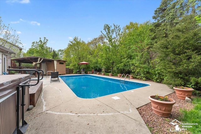 25345 Hunter Ln, Flat Rock, MI 48134 - outdoor pool with a patio area