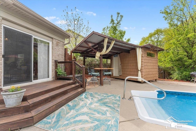 25345 Hunter Ln, Flat Rock, MI 48134 - swimming pool featuring a patio area, fence, and a wooden deck