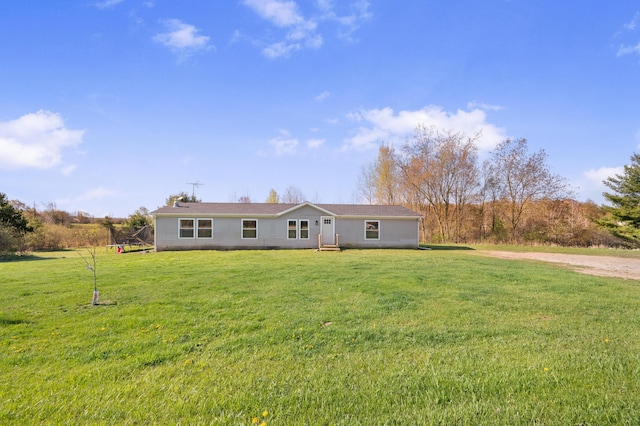 3311 5 Mile Rd, Sears, MI 49679 - single story home featuring a front lawn