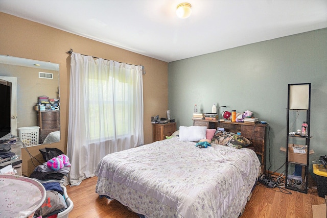 6606 Preston Rd, Howell, MI 48855 - bedroom with wood finished floors