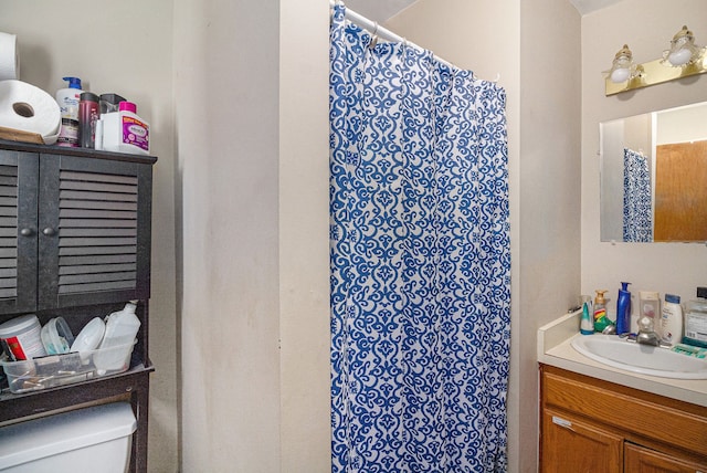 6606 Preston Rd, Howell, MI 48855 - bathroom with toilet, vanity, and a shower with shower curtain