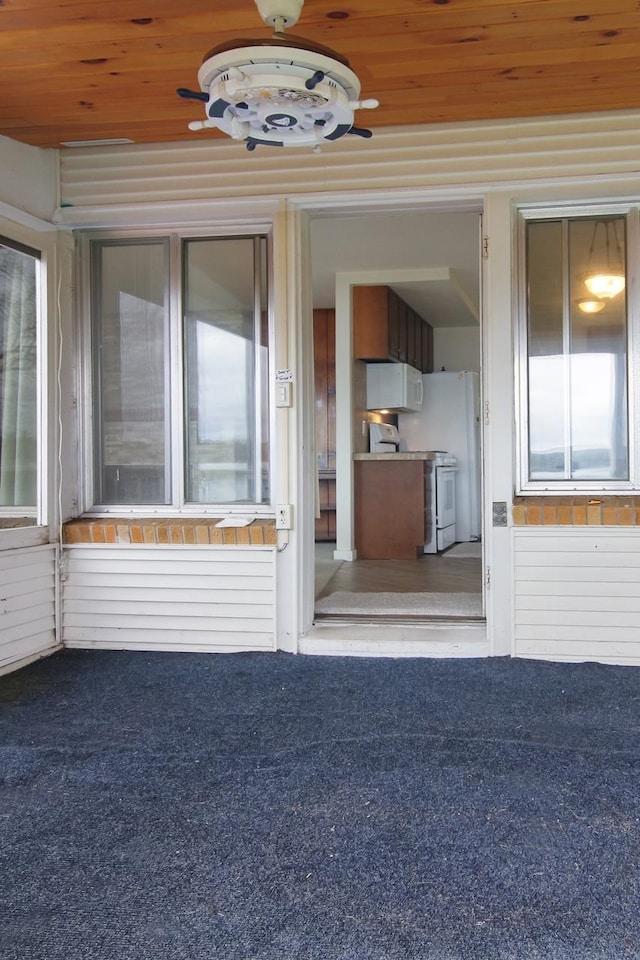 12225 SW Torch Lake Dr SW, Rapid City, MI 49676 - view of exterior entry