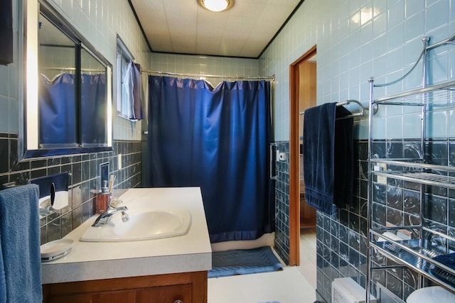 12225 SW Torch Lake Dr SW, Rapid City, MI 49676 - full bath featuring tile walls, a shower with shower curtain, decorative backsplash, and vanity