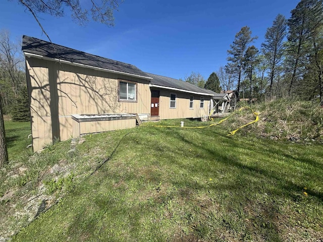 7415 Linden Rd, Fenton, MI 48430 - rear view of property with a lawn