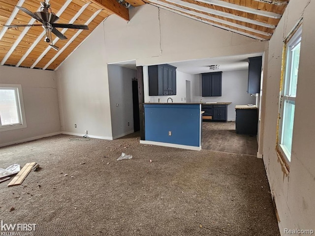 7415 Linden Rd, Fenton, MI 48430 - unfurnished living room featuring beamed ceiling, carpet, high vaulted ceiling, wood ceiling, and a ceiling fan
