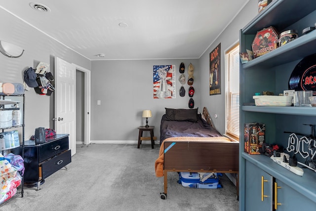 carpeted bedroom with baseboards