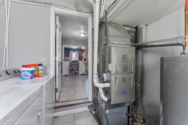 utilities with water heater and separate washer and dryer