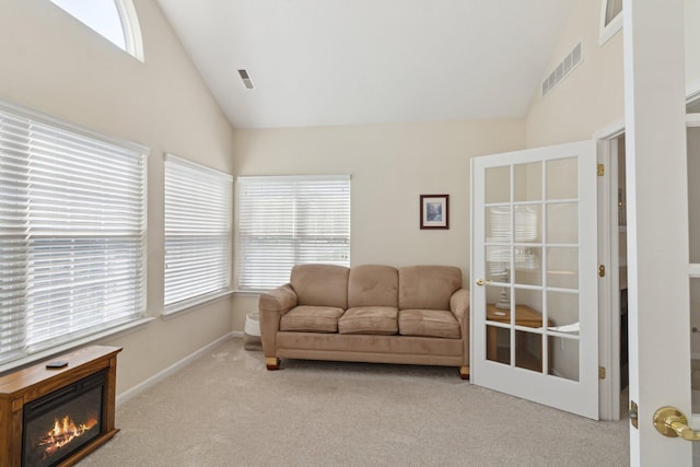 36160 Abbey Dr, Westland, MI 48185 - sitting room with carpet flooring, high vaulted ceiling, and a glass covered fireplace