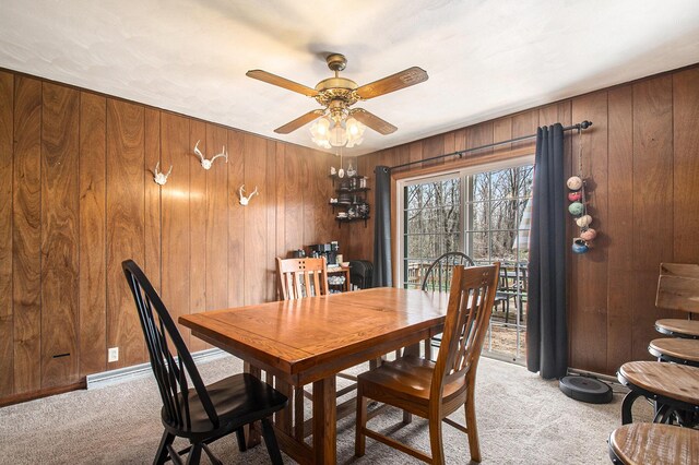 50427 M 51 N, Dowagiac, MI 49047 - dining room with light colored carpet, a ceiling fan, and wood walls