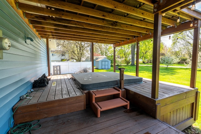 3484 Lakeshore Dr, Monroe, MI 48162 - wooden deck featuring a storage unit, a covered hot tub, and an outdoor structure