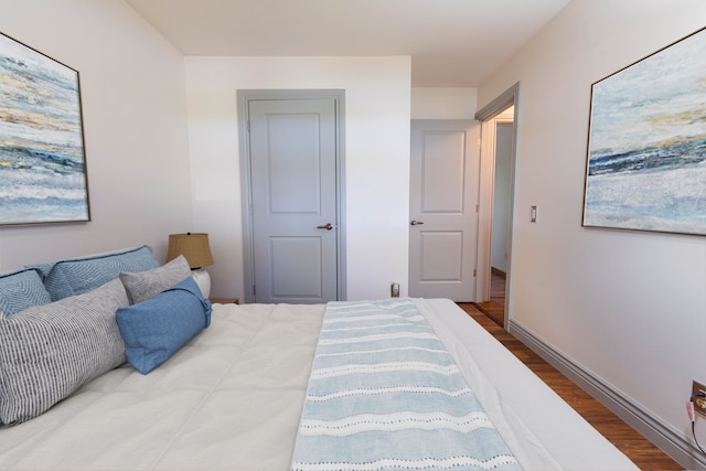 3484 Lakeshore Dr, Monroe, MI 48162 - bedroom featuring wood finished floors and baseboards