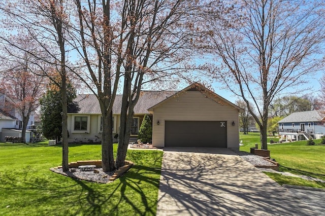 8439 Shoshoni Pass, Pigeon, MI 48755 - ranch-style home featuring an attached garage, driveway, and a front lawn
