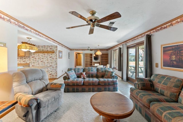 8439 Shoshoni Pass, Pigeon, MI 48755 - living room featuring a ceiling fan, carpet floors, crown molding, and wallpapered walls