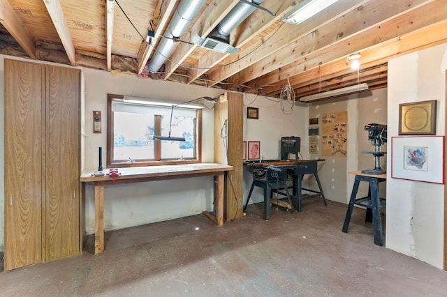 8439 Shoshoni Pass, Pigeon, MI 48755 - basement with a workshop area