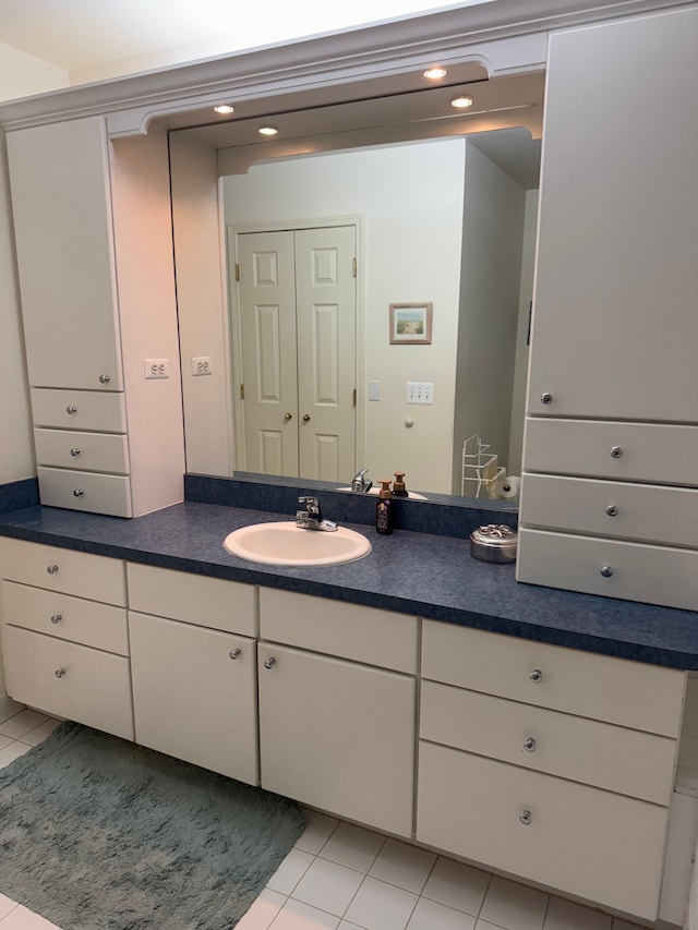 43632 Abbey Cir, Canton, MI 48187 - bathroom featuring tile patterned floors, vanity, and recessed lighting