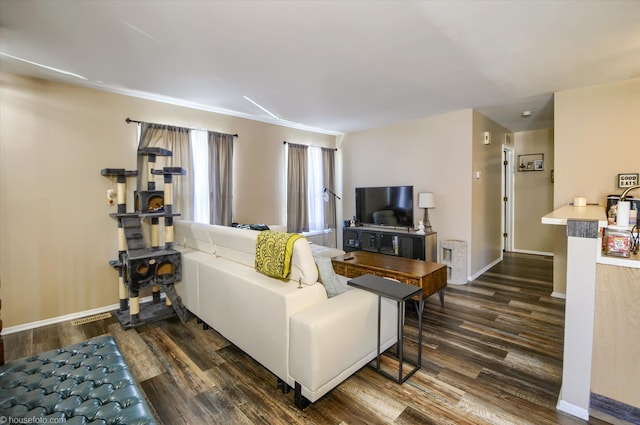 1445 Steeple Chase, Davison, MI 48423 - living area featuring dark wood-style floors and baseboards