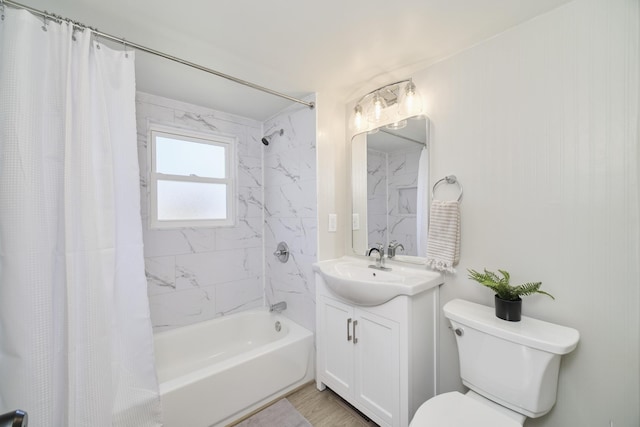 923 Maple St, Ludington, MI 49431 - bathroom with toilet, shower / bath combo, and vanity